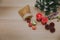 Top view studio shot of Christmas eve festival decorative items small sack bag full of gift present boxes Red candles Pine seeds