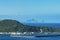 Top view of Suao township of Yilan and harbor against a skyline of green mountains in Taiwan