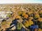 Top view subdivision neighborhood and colorful fall foliage in Flower Mound, America