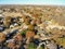 Top view subdivision neighborhood and colorful fall foliage in Flower Mound, America