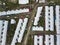 Top view of a subdivision of rowhouses with white sheet metal roofs for low to middle income families. At Naic, Cavite,