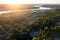 Top view of the Svir river and urban village in forests of Karelia.