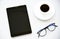 Top view tablet,pen,glasses and Laptop