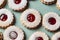 Top view of taditional Austrian or German Linzer cookies with shortcrust pastry and jam filling