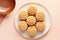 Top view of taditional Chinese Mooncake pastries on plate