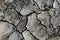 Top view of the texture of a cracked part of a mud volcano