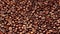 Top of view of texture of roasted coffee beans