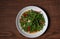 Top view Thai food stir fried morning glory on wooden table