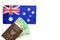 Top view of Thailand passport have Australian cash money in its put on Australia flag on white background