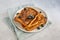 Top view of three slices of french toast with blueberries on a plate on grey background, minimalistic style with copy space