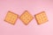 Top view of three sugar cracker isolated on pink background