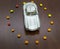 Top view of toy car in sugar stars in form circle