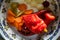 Top view on traditional serbian winter stores pickled vegetables in plate