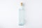 Top view of transparent glass bottle with plug