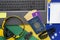 Top view of travel objects: Brazilian passport, notebook, sunglasses, keys, credit card, notepad, pen, money and Brazilian flag in