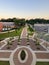 Top view of UAH residence hall and greenway near parking spot surrounded by lush trees and bushes