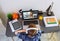 Top view of unrecognizable boy with headphones receiving class at home with laptop