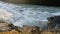 Top view of unrecognizable tourists taking photos to Gullfoss Golden waterfall