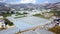 Top view of urban agriculture with greenhouses. Clip. Panorama of urban plantations with greenhouses for growing food