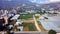 Top view of urban agriculture with greenhouses. Clip. Panorama of urban plantations with greenhouses for growing food