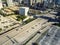 Top view vacant parking lots with downtown Dallas skylines in ba