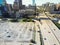 Top view vacant parking lots with downtown Dallas skylines in ba