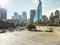 Top view vacant parking lots with downtown Dallas skylines in ba