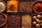 Top view of a variety of spices and seeds arranged in a row of small wooden trays, Ai-generated.