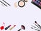Top view of various make up accessories decorative cosmetics products. Workplace, cosmetics, lipstick, nail polish, mascara, face