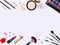 Top view of various make up accessories decorative cosmetics products. Workplace, cosmetics, lipstick, nail polish, mascara, face