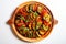 Top View, Vegan Ratatouille On A Wooden Boardon White Background