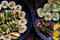 Top view vegan Vietnamese eating indoor restaurant, vegetarian rice rolls cut in slice with vegetable