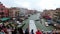 Top View of Venice Italy Grand Canal, view of the crowd of people standing on the Rialto Bridge.