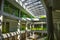 Top view of the vestibule with natural daylight from under the glazed frames, ceiling in the international College in Dilijan