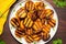 top view of a vibrant plate of mango bbq grilled plantains