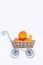 Top view Vintage Garden carriage basket with ripe pumpkins on the white background isolated . Autumn harvest, thanksgiving, hallow