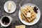 top view waffles plate with butter cup tea. High quality photo