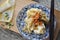 Top view of Wanton Dish Chinese Food on Wooden Board