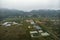 Top view of the wetlands of the island of Cat BA near the sea on land. Morning gloomy landscape of the countryside