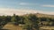 Top view of white dome of observatory at top of hill. Shot. Panoramic view of astronomical observatory complex in wild