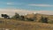 Top view of white domed buildings of observatories on hill. Shot. Astronomical research facilities and large