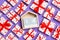 Top view of white gift boxes with hearts and wooden calendar on colorful background. The fourteenth of February. Valentine`s Day
