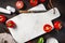 Top view on a white marble tray with fresh cherry tomates