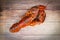 Top view of whole fresh red lobster shellfish in the seafood restaurant /  Steamed lobster ready to be cooked food on wooden table