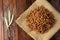 Top view of the whole mass of Fusilli, on fabric, rough towel, on a wooden background