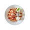 Top view of whole wheat Belgium waffle topped with strawberry syrup , whipped cream , walnuts and chocolate ice cream isolated on