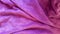 Top view of winter purple blanket with wrinkles