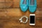 Top view of woman accessories collection over wooden background