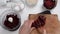 Top view of woman hands cooking healthy dessert with red beet roots, oats and eggs