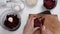 Top view of woman hands cooking healthy dessert with red beet roots, oats and eggs